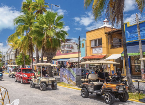 Go via San Pedro or Caye Caulker First